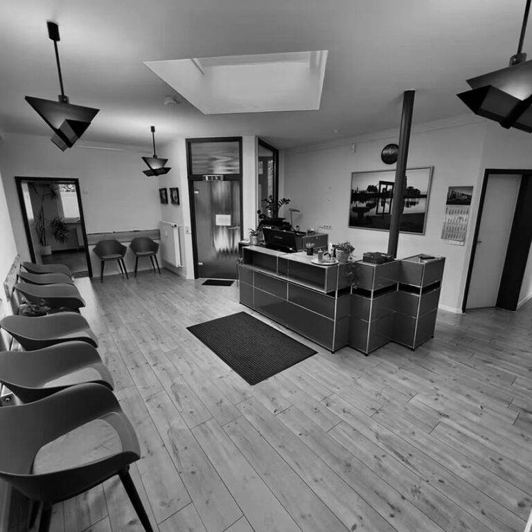 PAM_professional-physiotherapist-massaging-leg-of-a-sp-2024-12-13-21-17-05-utc Image description